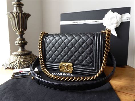 boy chanel bag gold hardware|chanel boy bag medium caviar.